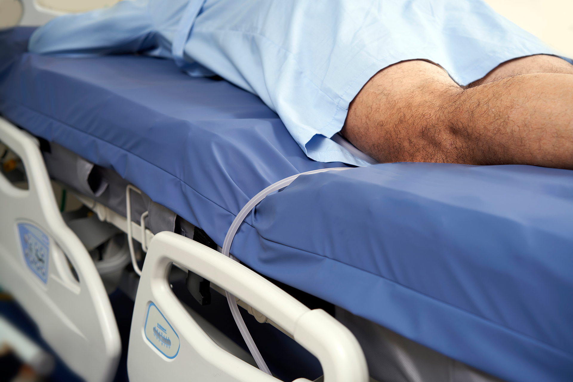 Prone position mattress with airway and tubing management